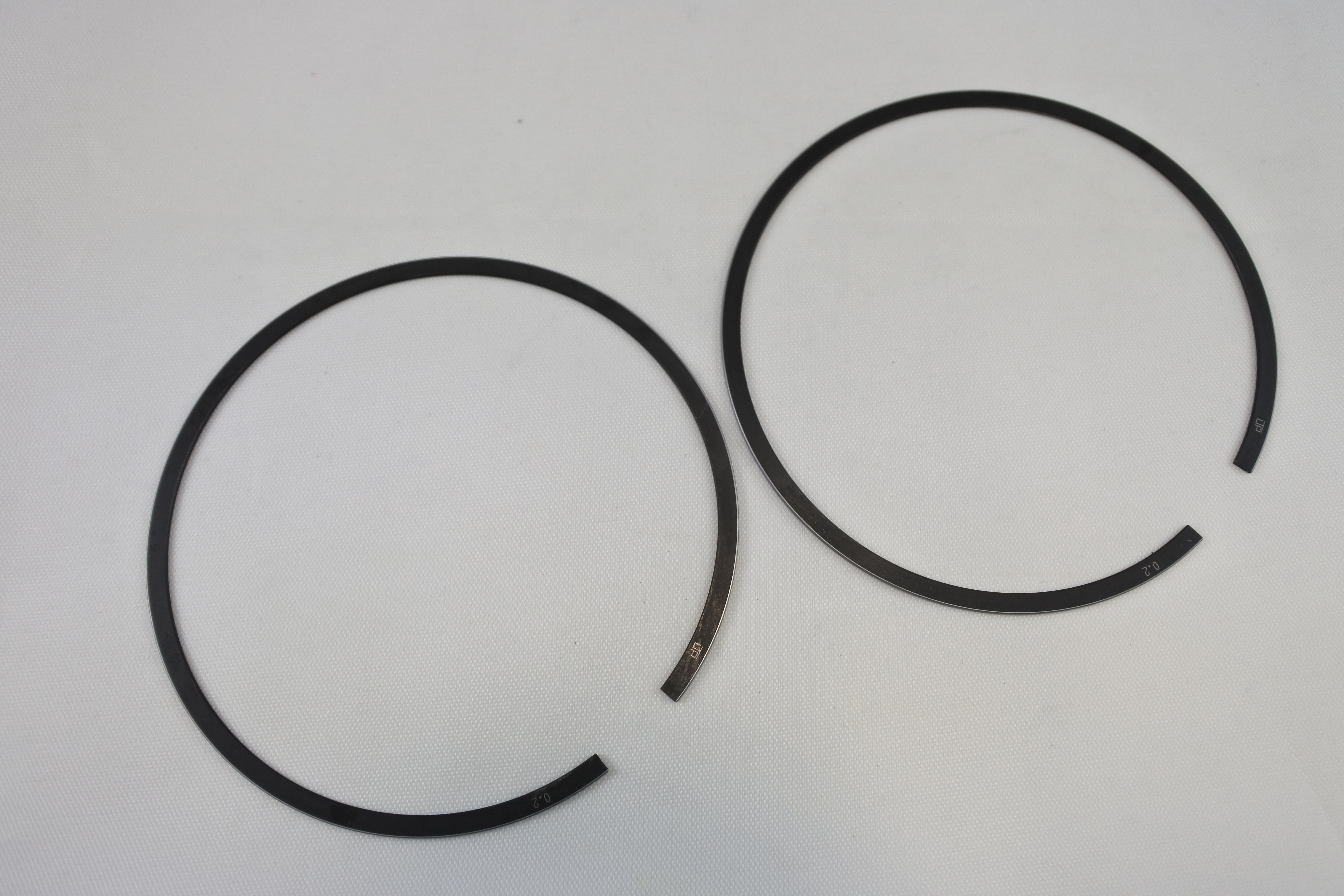 PISTON RING SET 70-78 OSSA ALL MODELS 250 1ST OVERSIZE .20 MM OVER VINTCO OW-118-054S-20 image 1