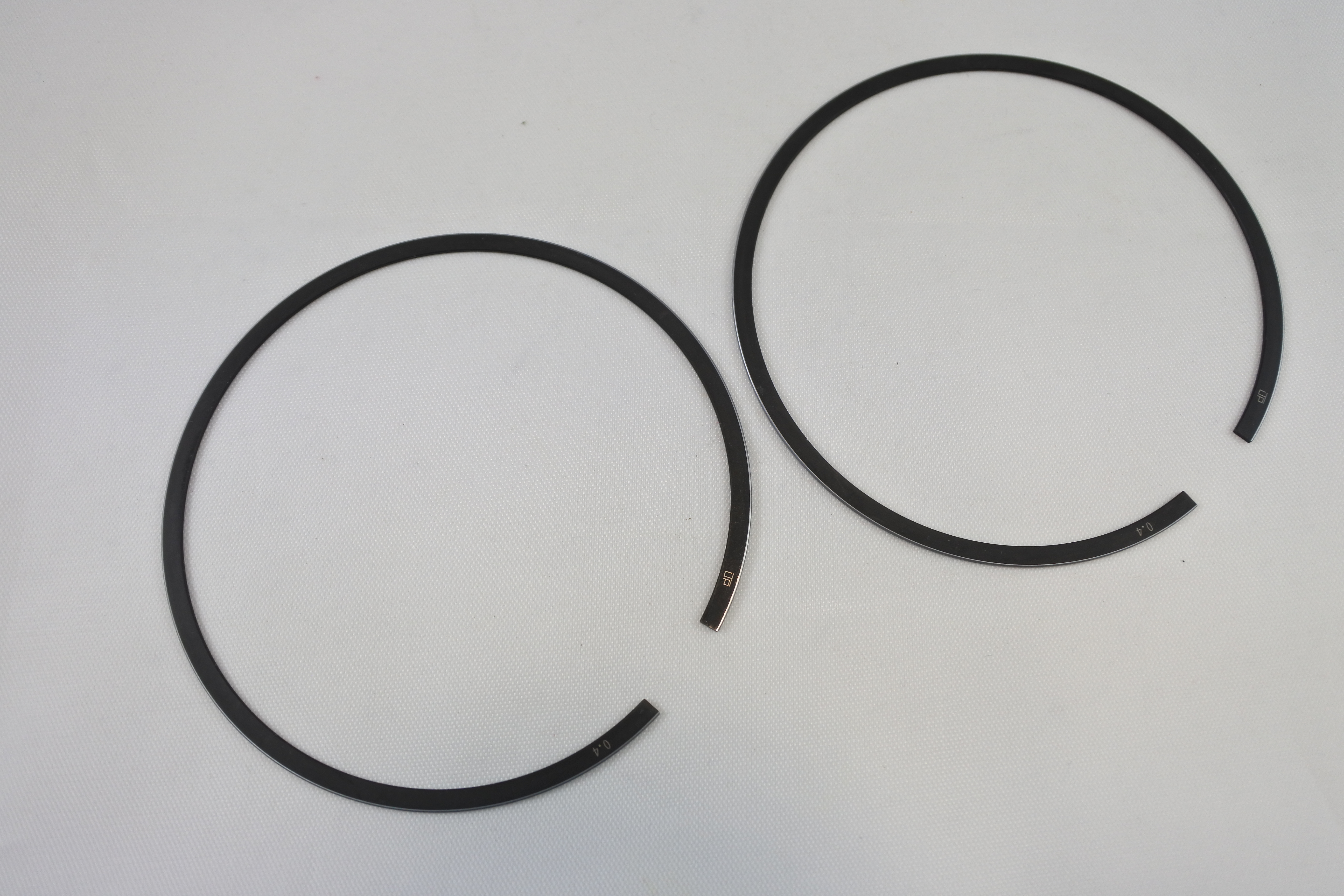 PISTON RING SET 70-78 OSSA ALL MODELS 250 .40 mm OVER VINTCO OW-118-054S-40 image 1
